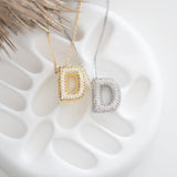 COLLIER INITIAL