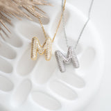 COLLIER INITIAL