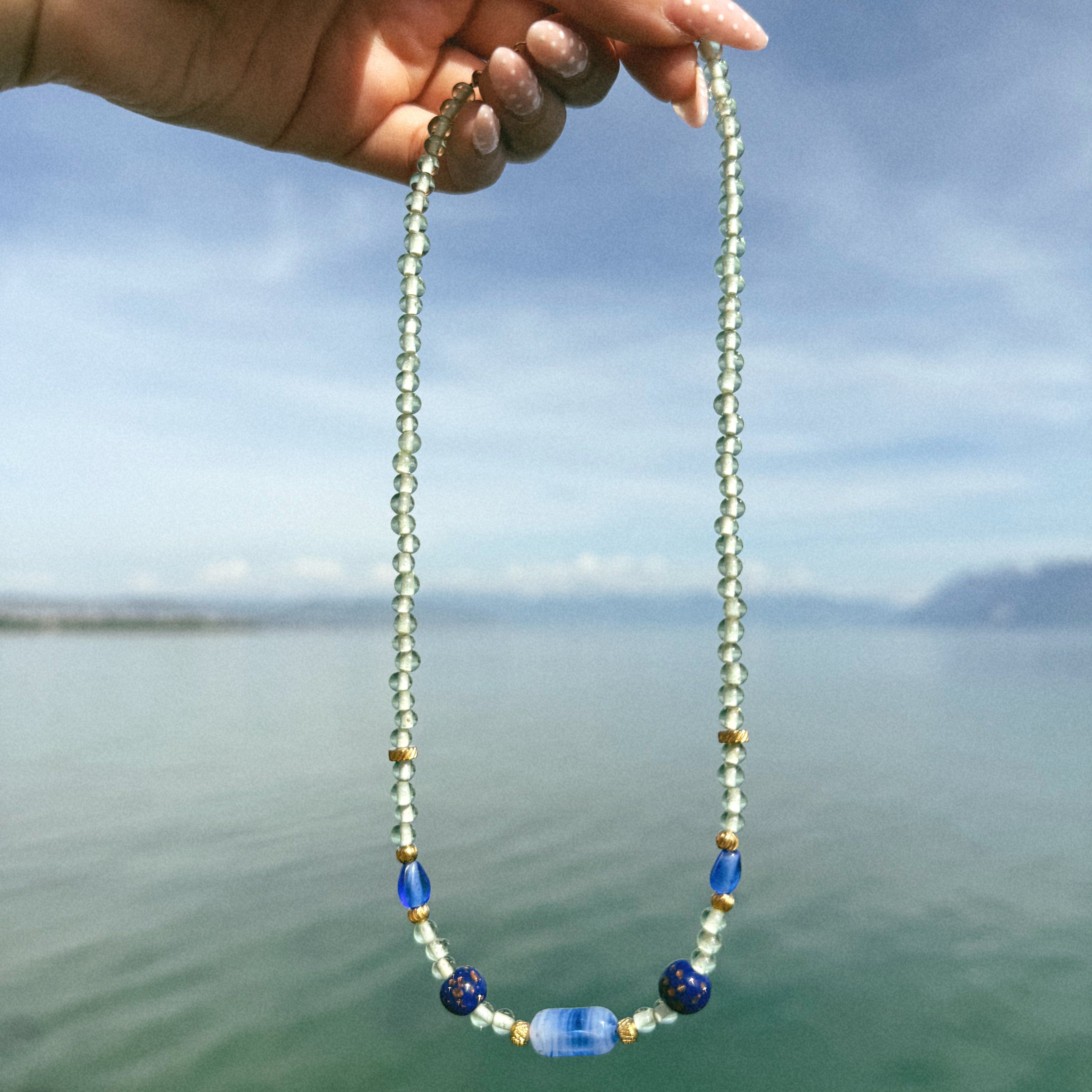 COLLIER MURANO